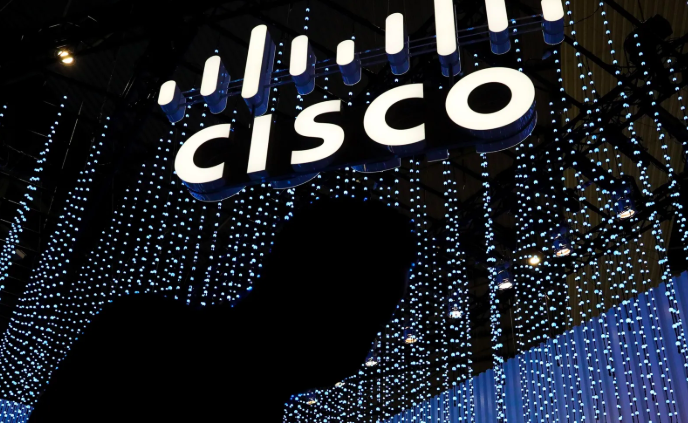 Cisco logo in neon white lights, surrounded by sparkly lights.